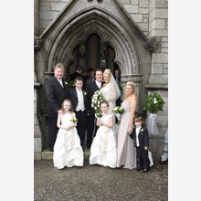 The bridal party outside the church