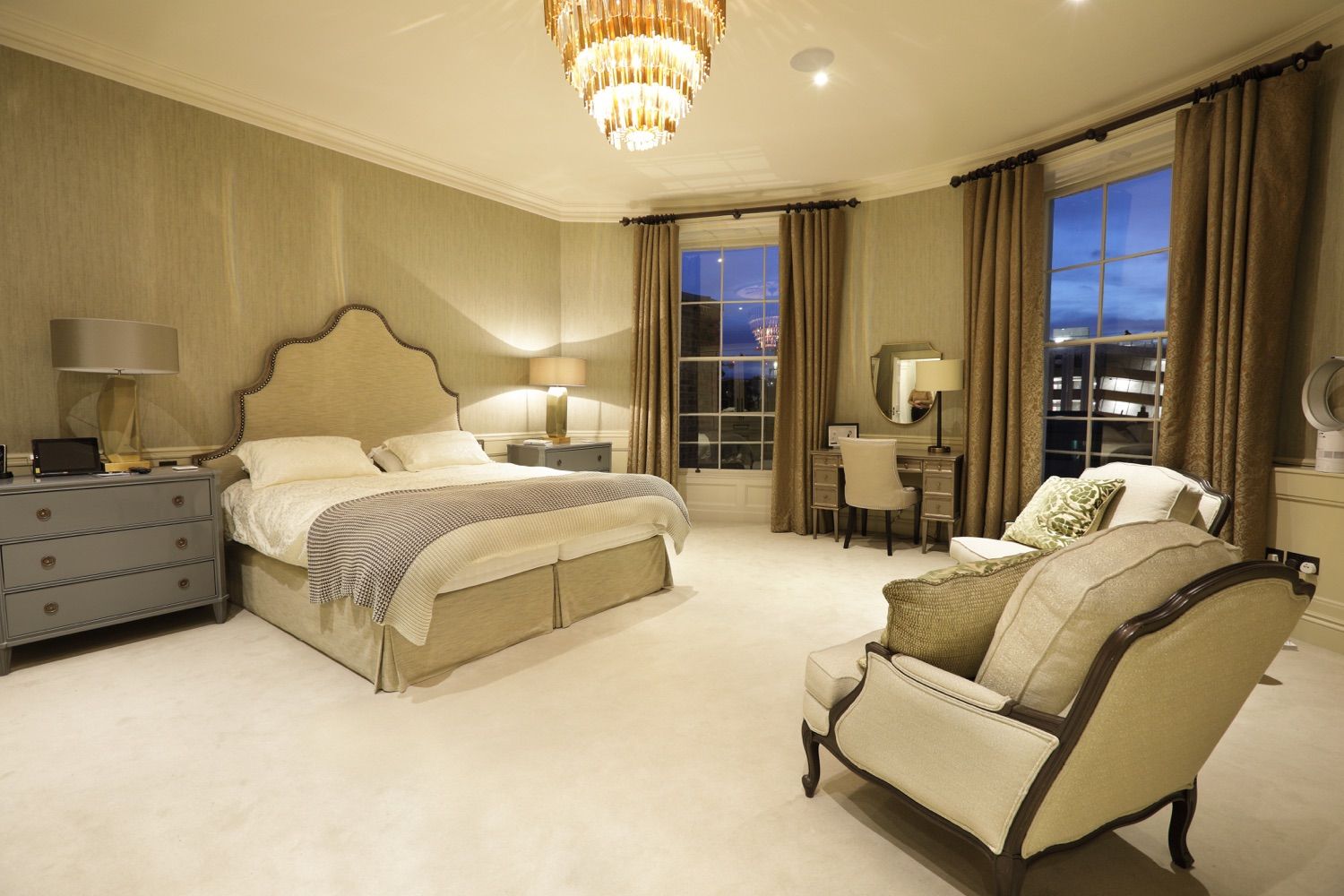 The first floor bedroom to the rear of the property with windows in the curved wall