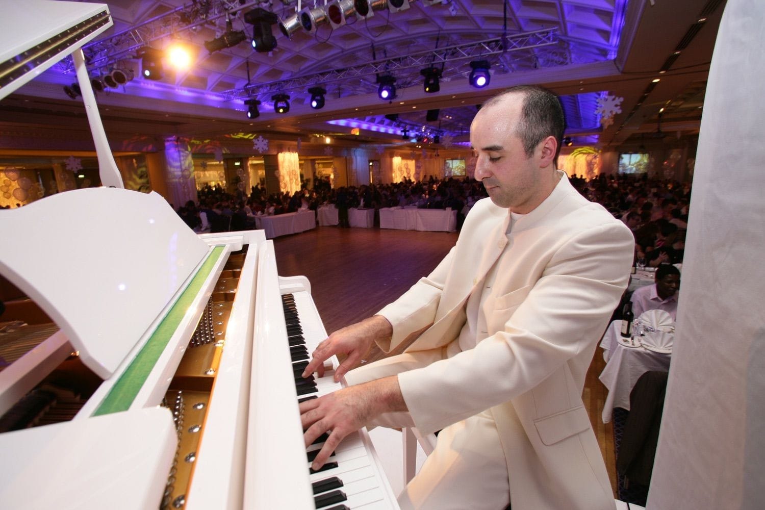 Entertainment during dinner at a Christmas party in the clayton Hotel, Burlington road, Dublin