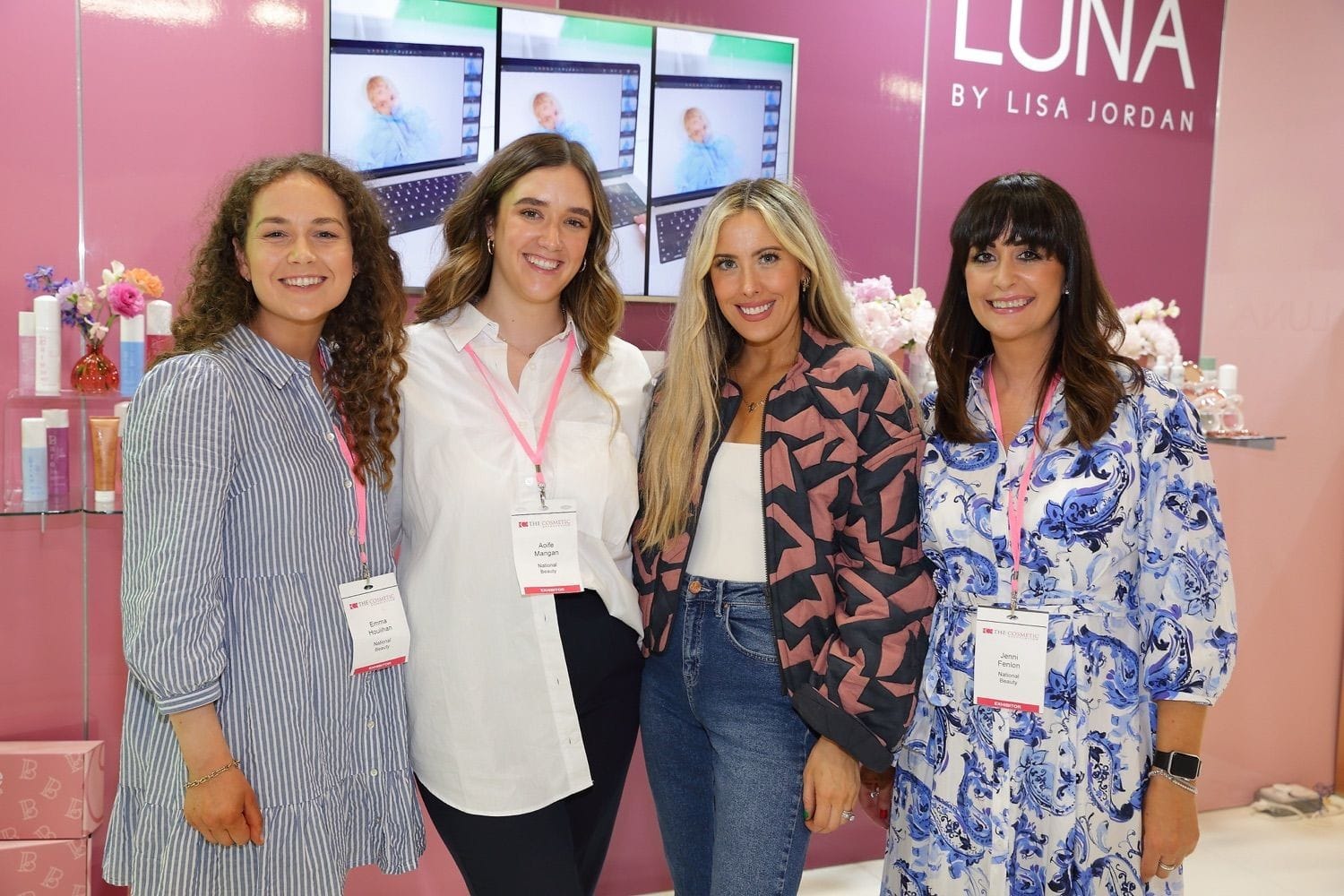 Pretty ladies are ready to help their clients during an industry trade show in the main hall of the RDS, Dublin