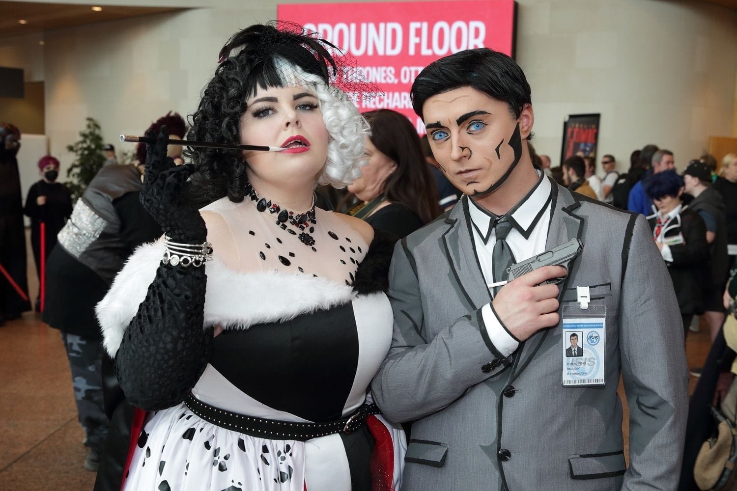 Characters dressed up as Cruella De Ville and comic spy at Comicon, held in the Conference Centre Dublin