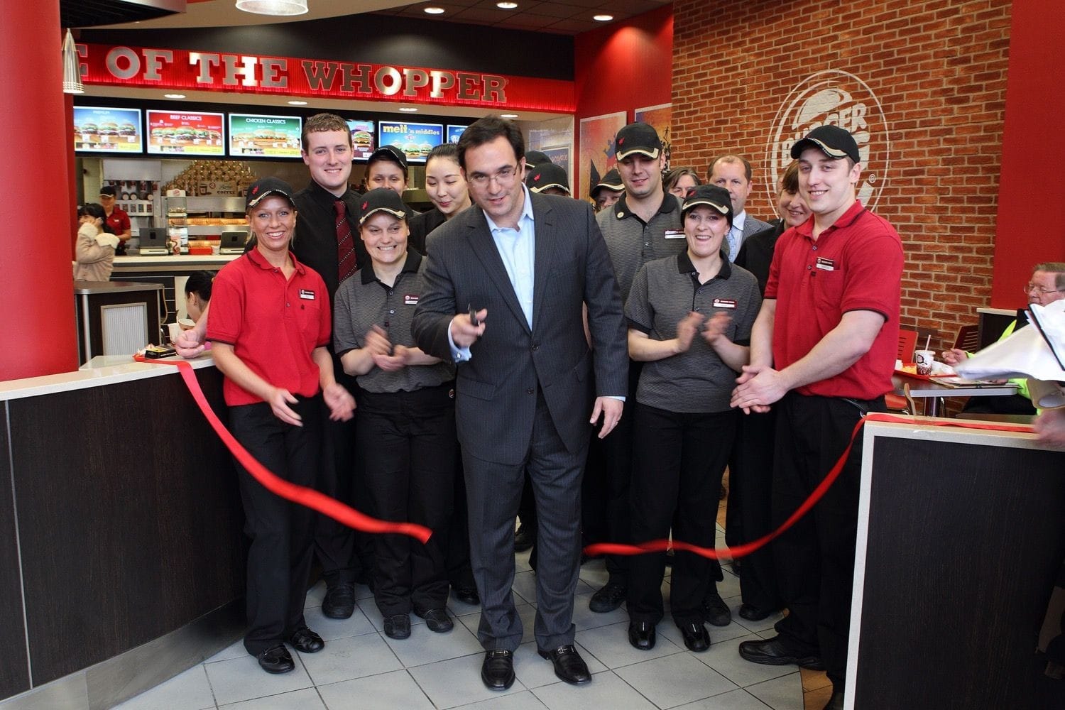 Jose E. Cil and staff cut the ribbon at the opening of Burger King O'Connell Street, Dublin