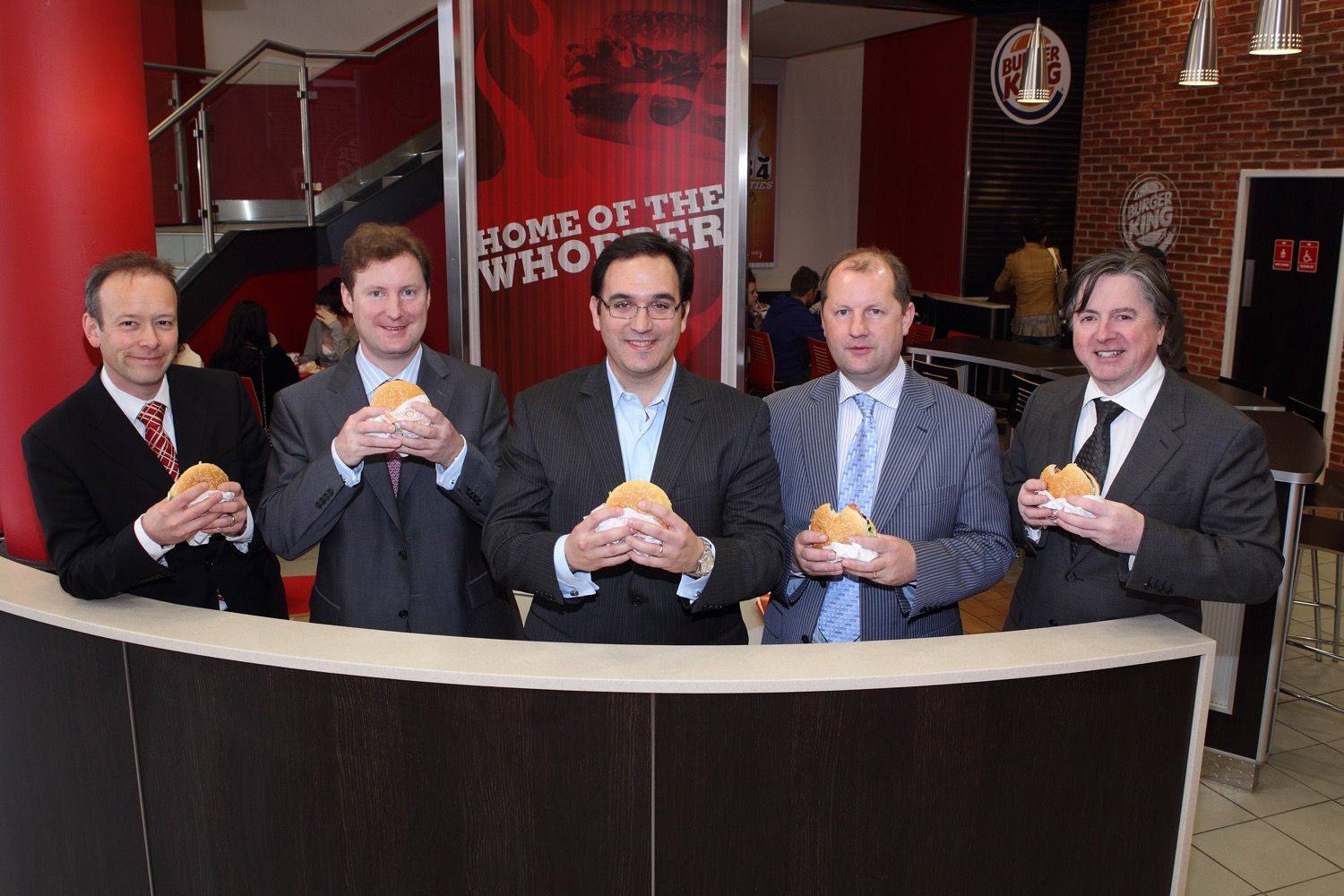 Jose E. Cil and the irish management at the opening of Burger King O'Connell Street, Dublin