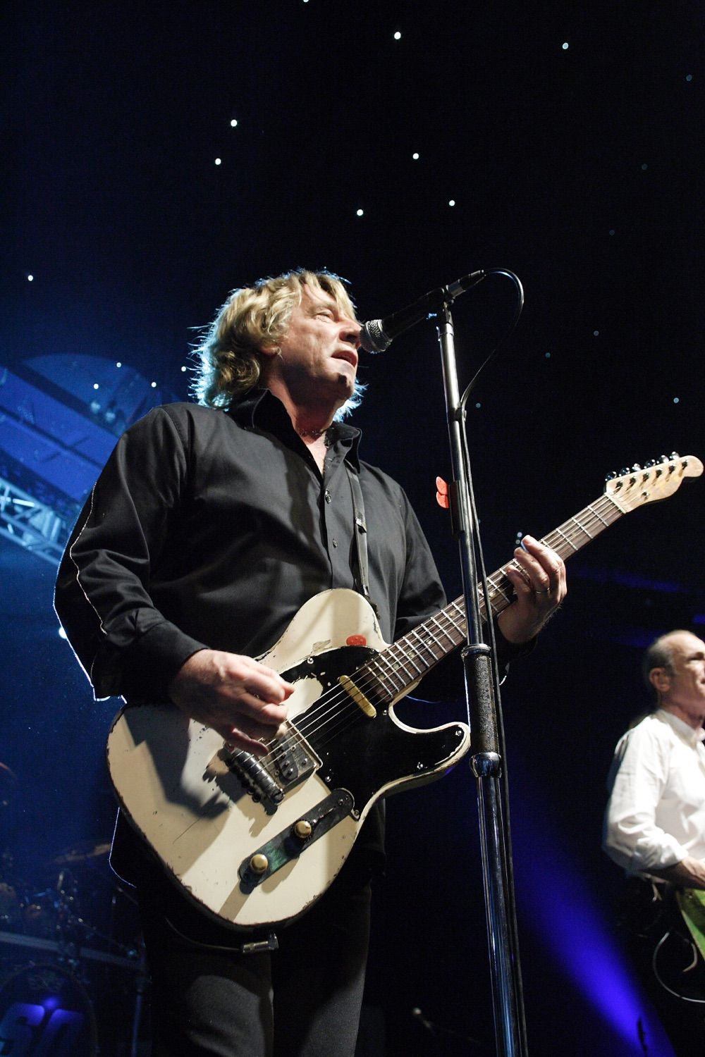 Rick Parfitt onstage with the other members of Status Quo at a private 50th birthday party in the Round room of the Mansion House, Dublin