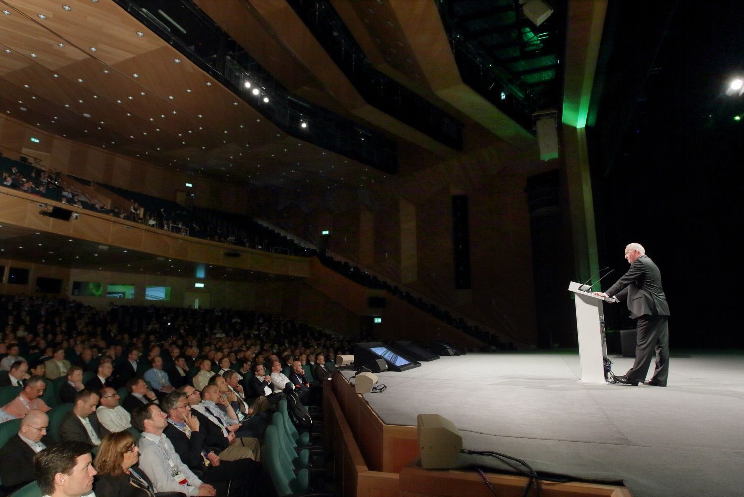 A photograph showing the speaker and audience in the main stage of the Convention Centre Dublin