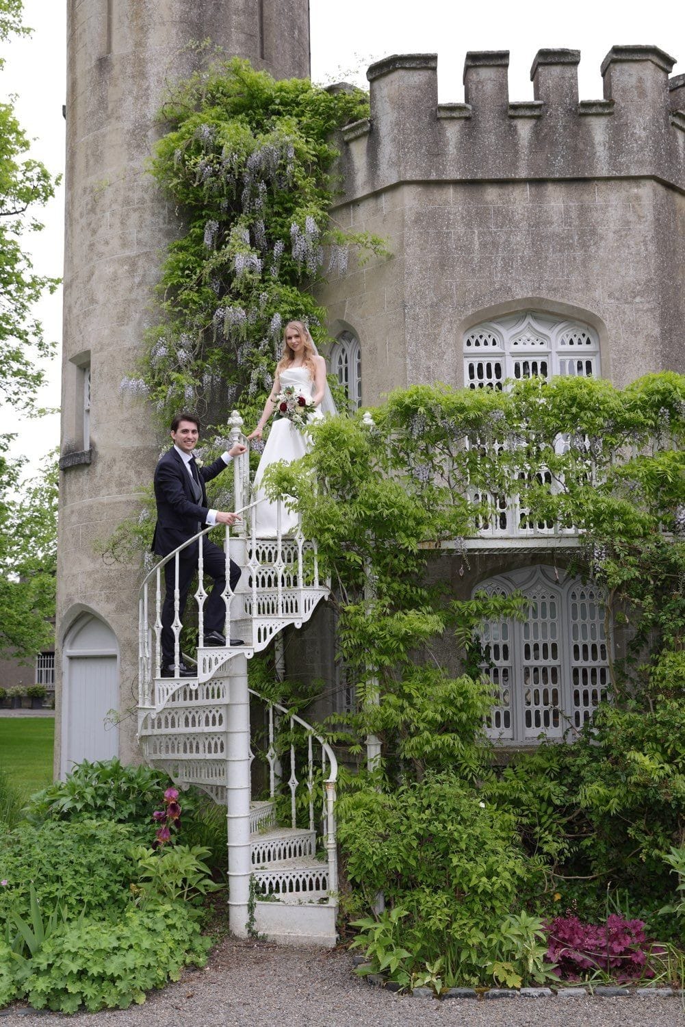 The bride and groom meeting on the back stairs of Luttrelstown castle