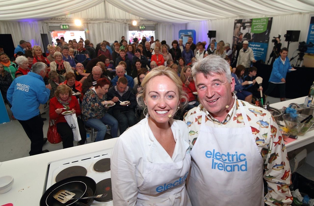 Rachel Allen and Richard Colligan  pose in front of the audience in the  Electric Ireland tent at the National Ploughing Championships at Ratheniska, Co Laois