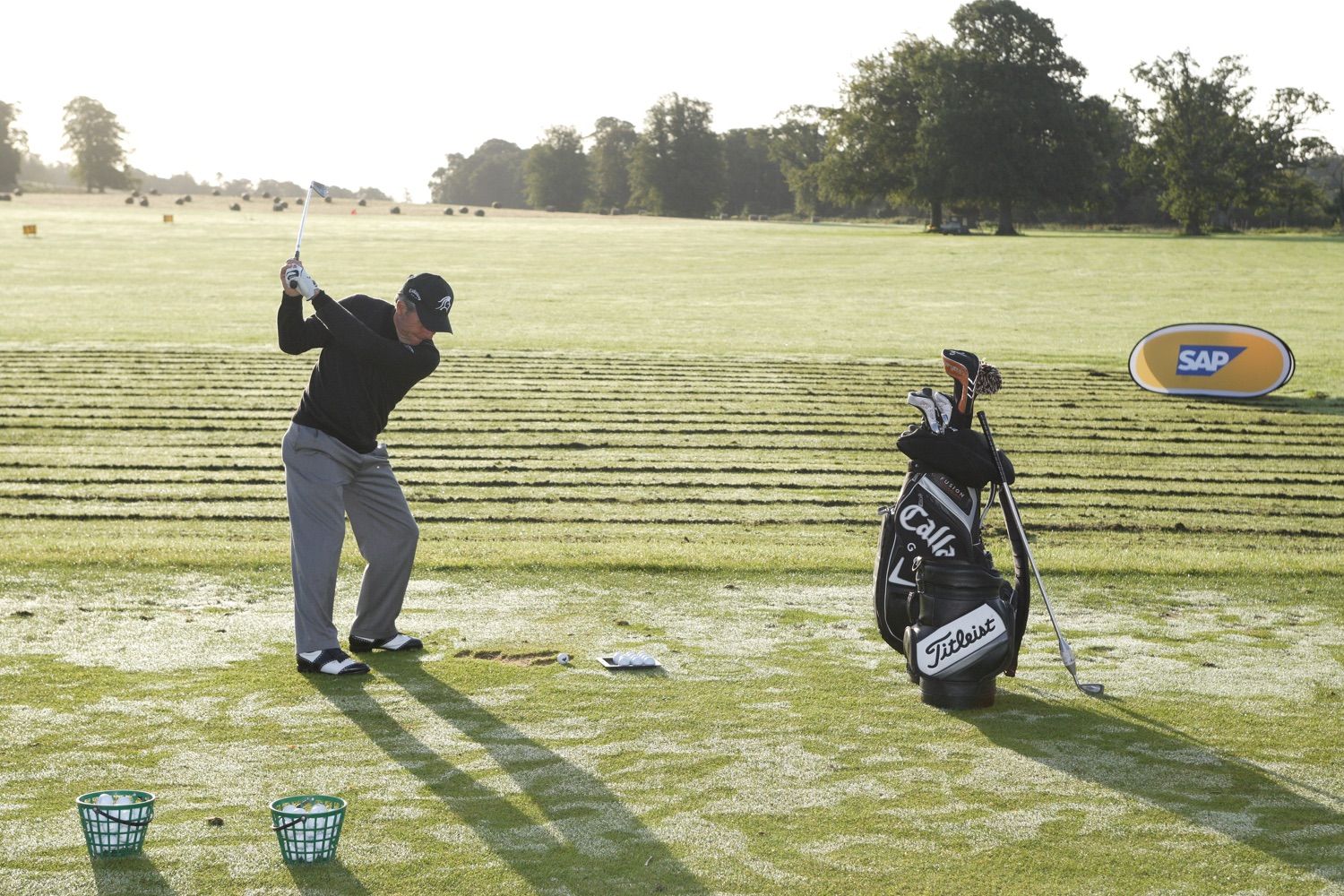 Gary Player warms up on the practice range of Carton House, before giving a golf masterclass to staff and management of SAP Software Solutions