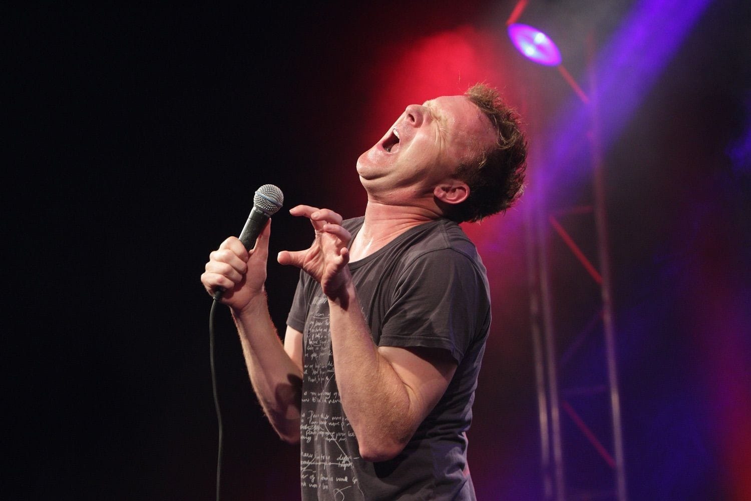 Jason Byrne does a T Rex impression at  the Vodafone Comedy Festival which was held in the Iveagh Gardens, Dublin, Ireland