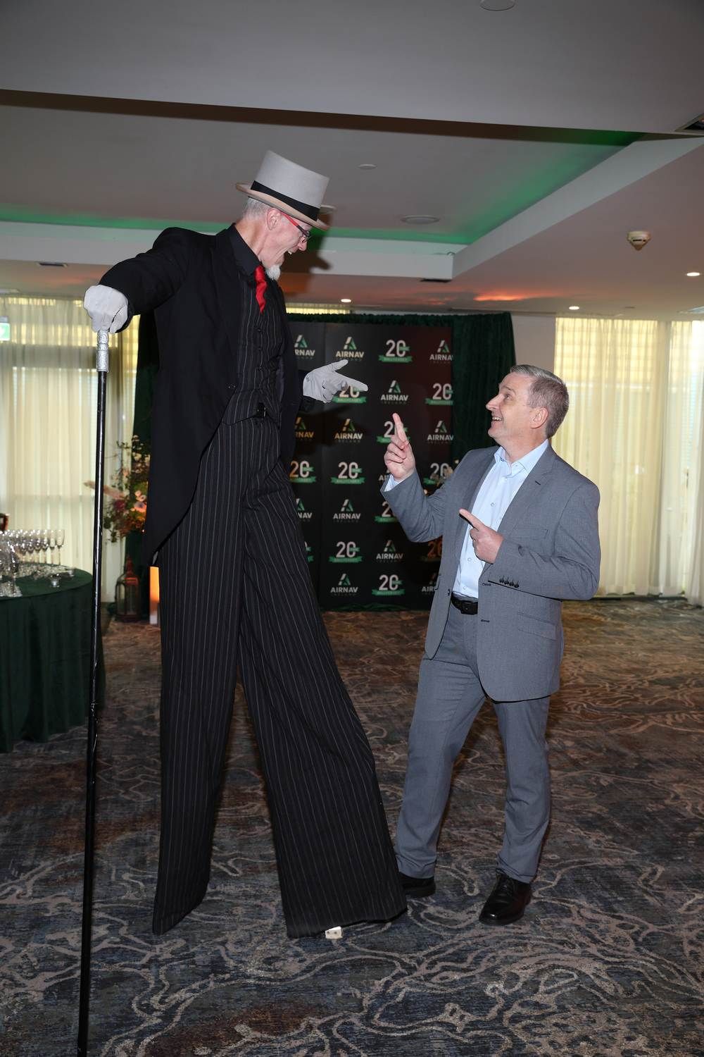 Stilt walker entertainer at the Airnav 20 Year Anniversary event in the Limerick Strand Hotel, Limerick