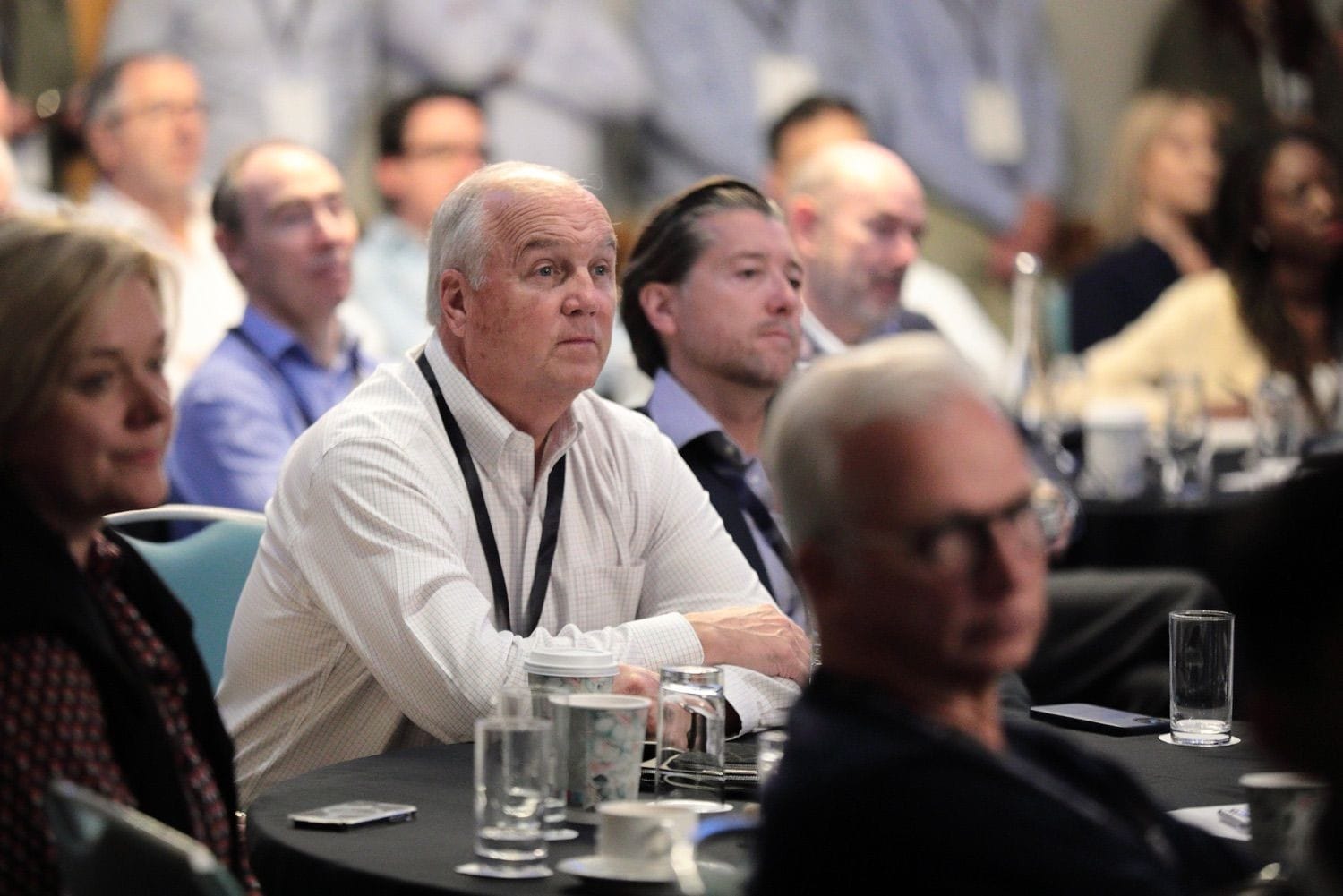 A male delegate listens during a presentation in the Conrad Hotel, Dublin