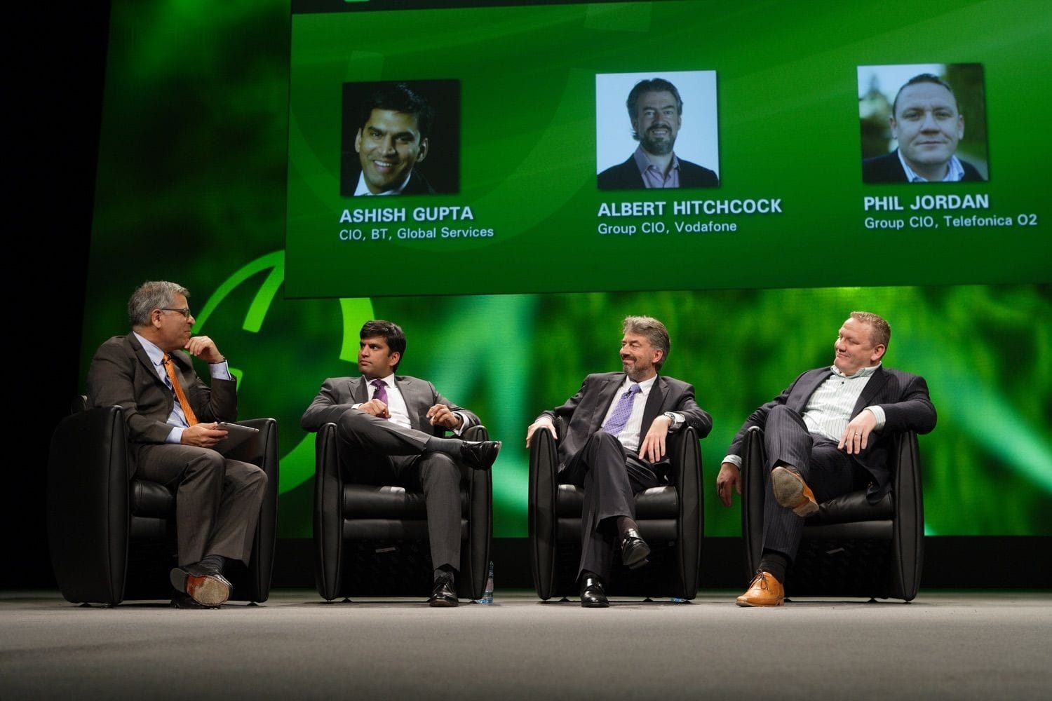 Speakers form a panel to discuss questions ata aconference in the Convention Centre Dublin