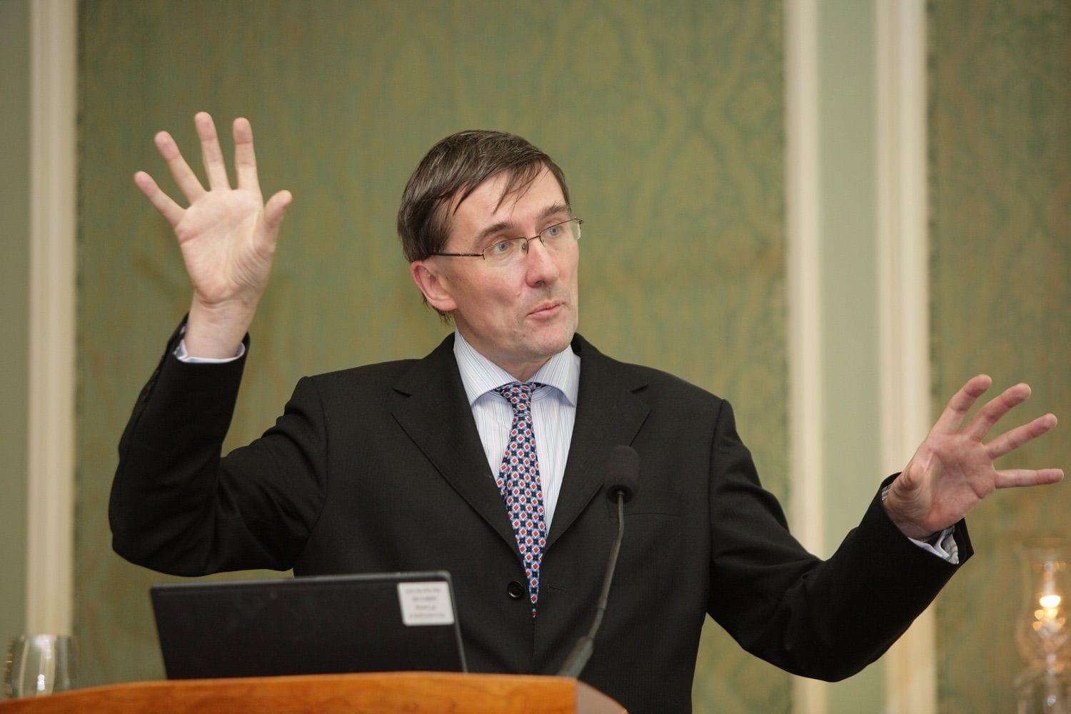 A speaker uses his hands to demonstrate a point during his presentation in the Intercontinental Hotel, Dublin