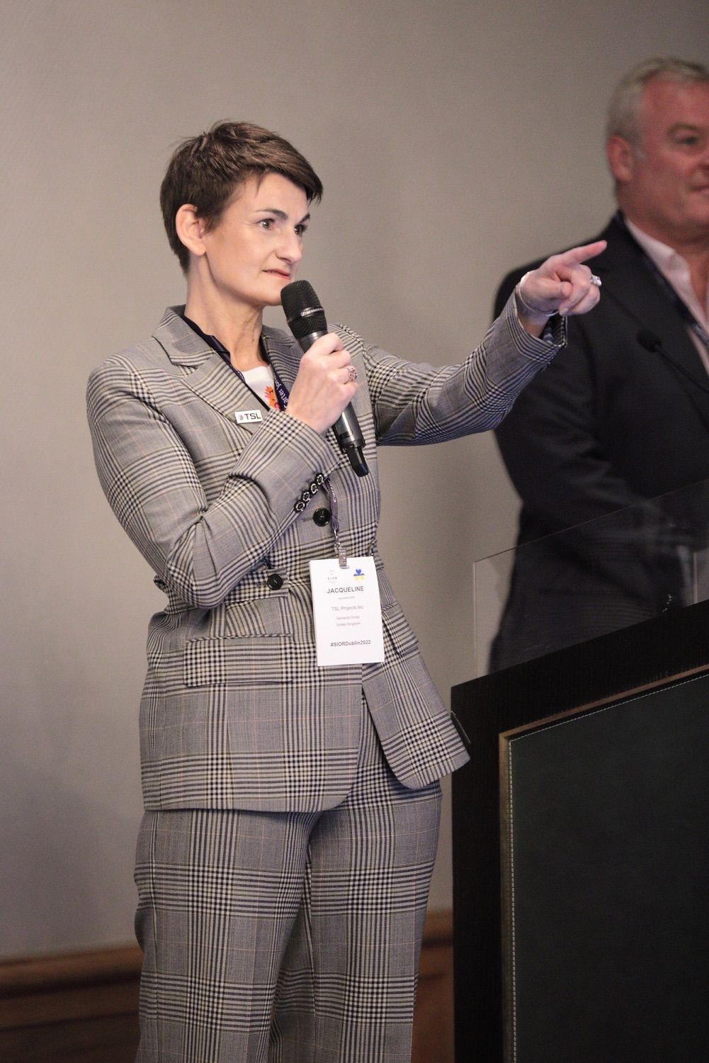 A female speaker fields questions from the audience at a SIOR confernce in teh Conrad Hotel, Dublin