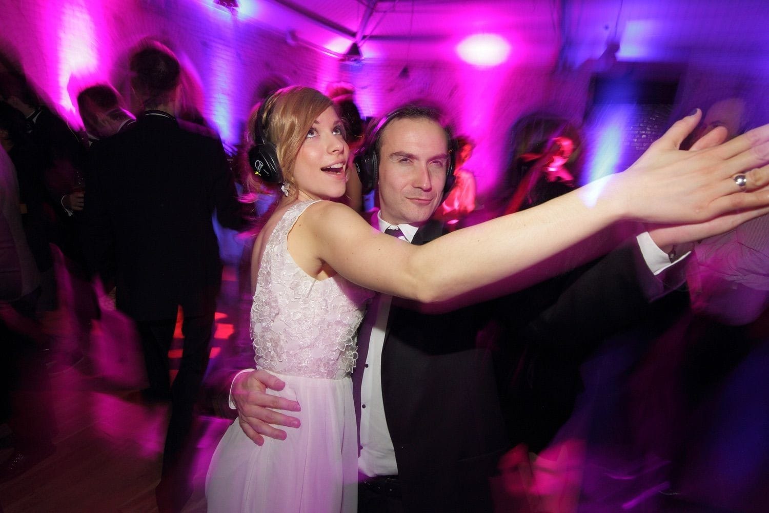 A couple dance to the music at a silent disco in teh Guinness Storehouse, Dublin