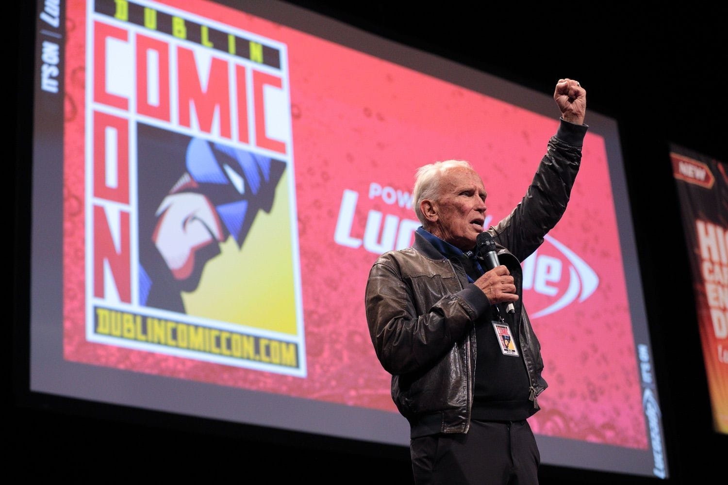 Peter Weller, the actor who plays RoboCop, punches the air, while addressing the audience at Comocon, held in the Dublin Convention Centre