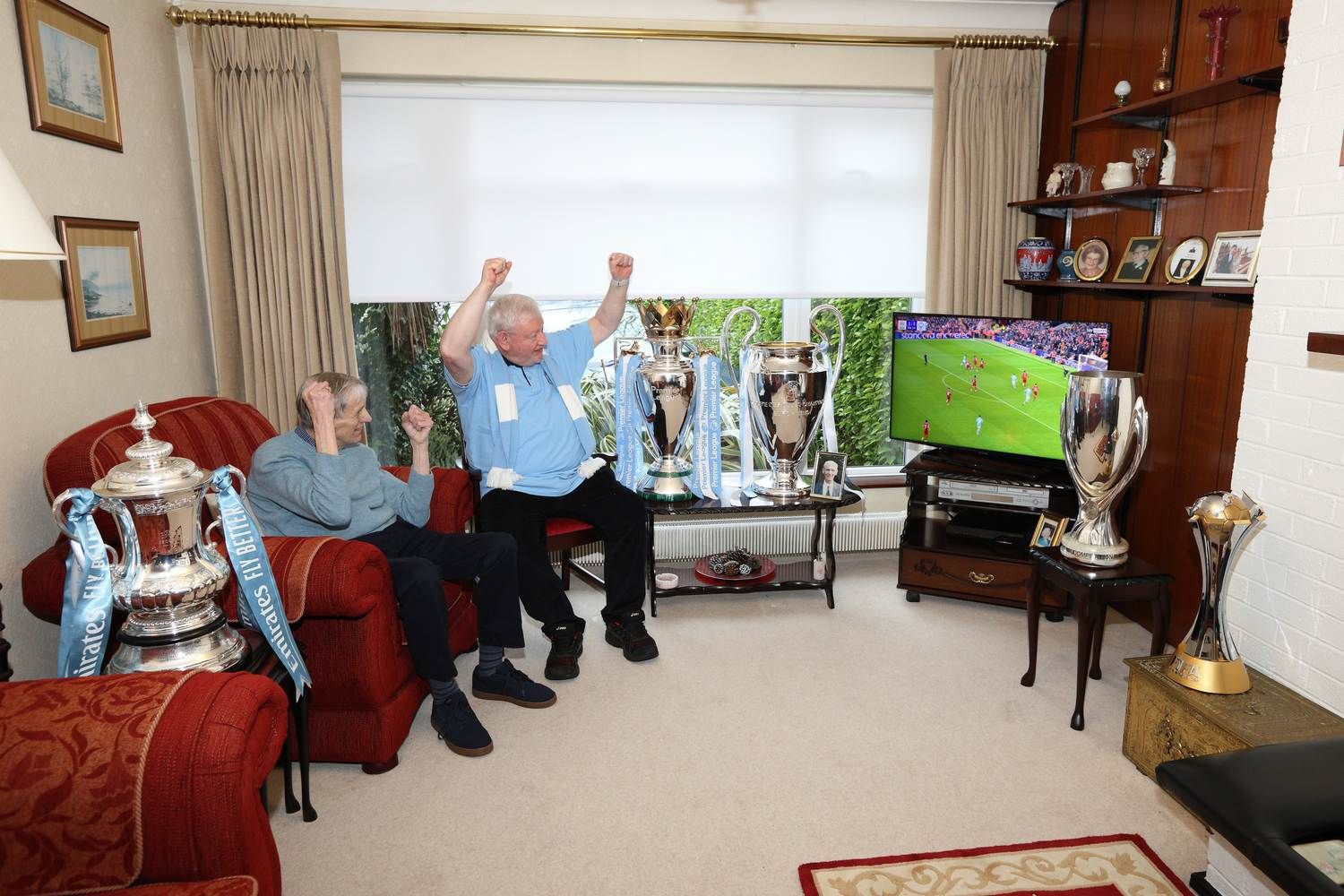 Founders of Manchester City fan club in Ireland get a home visit with the Premier League, FA Cup, UEFA Champions League, UEFA Super Cup and FIFA Club World Cup