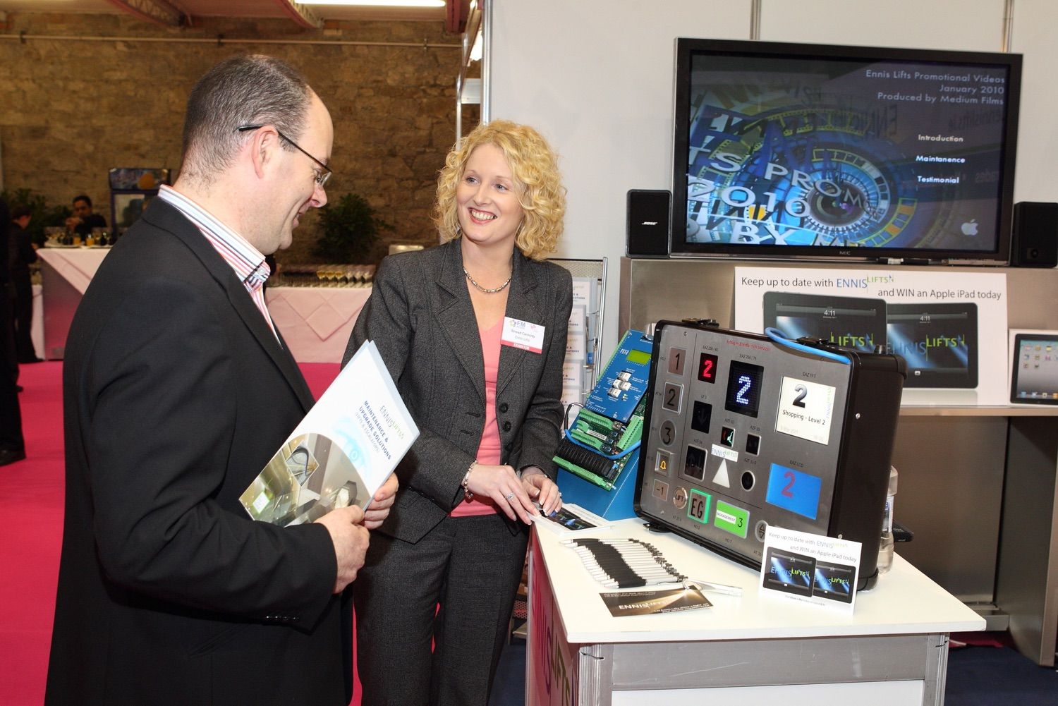 A customer has the range of products explained at the Facilities Management shot in the Industries Hall of the RDS, Dublin