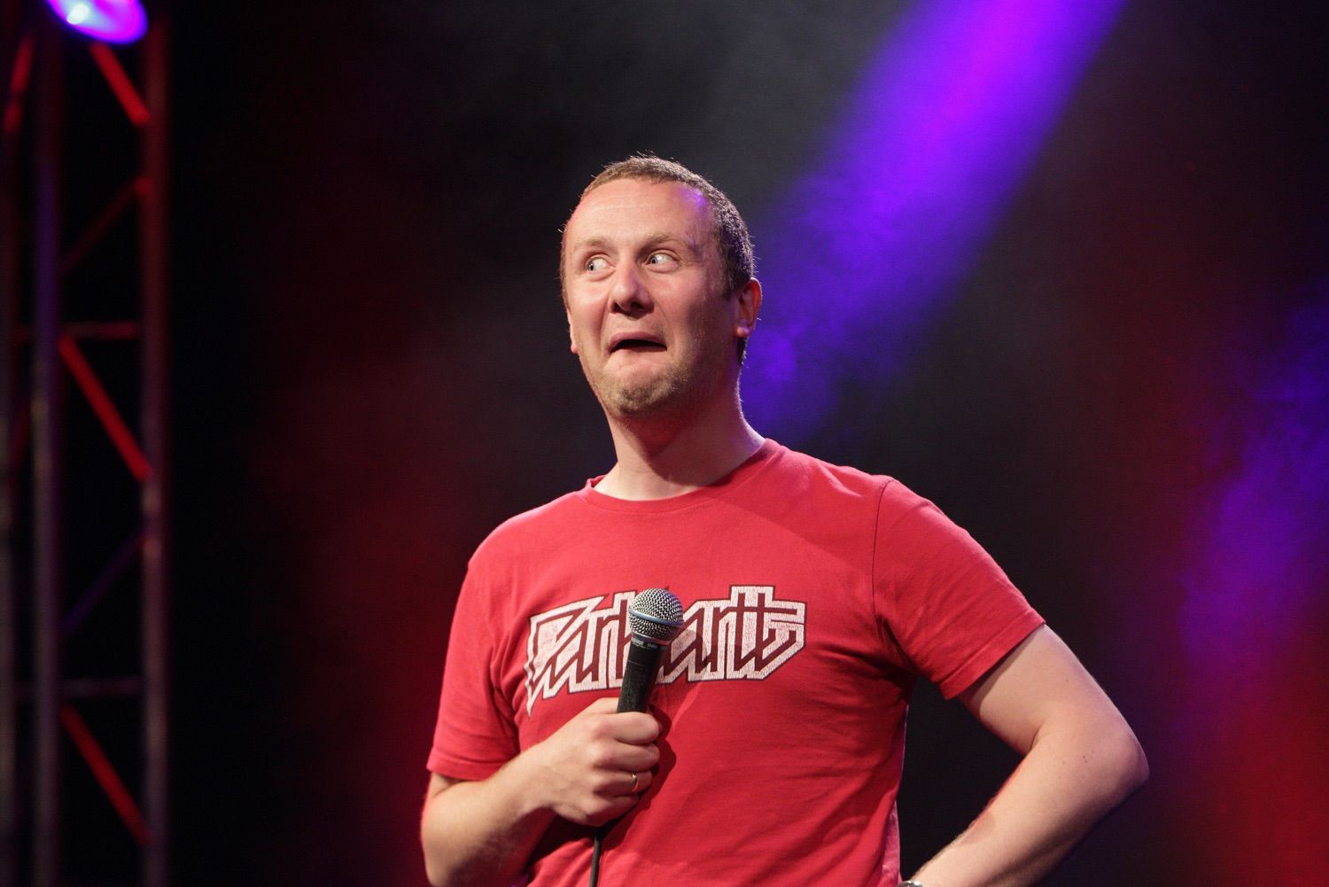 PJ Gallagher is pulling a funny face onstage at the Vodafone Comedy Festival which was held in the Iveagh Gardens, Dublin, Ireland